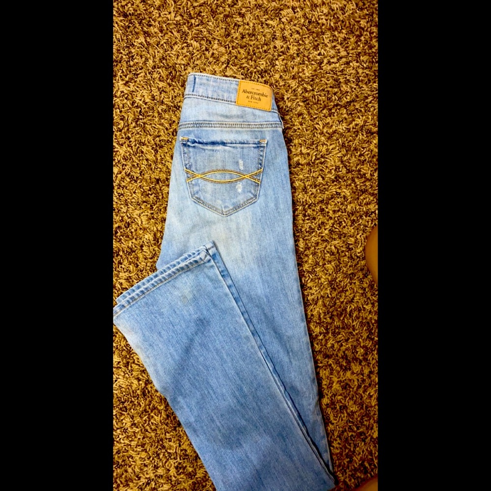 Light blue ripped jeans